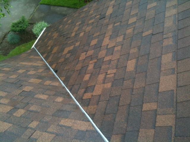 Roof valley after eco-friendly moss treatment