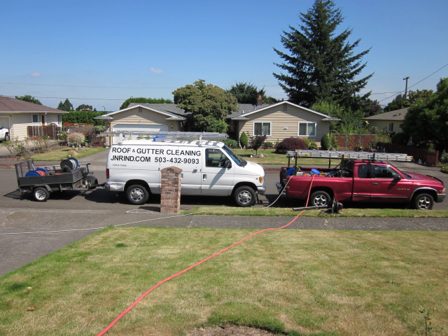 The JNR van and rig — Roof & Gutter Cleaning, JNRIND.COM — parked at a Portland job